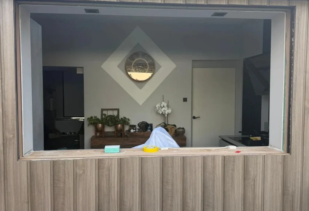 Large window opening with wood-look cladding